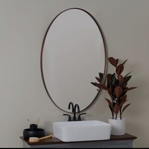Oval wall mirror